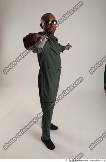 24 2018 01  ERIC PILOT STANDING POSE WITH GUNS